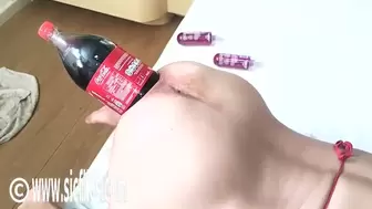 Rammed two Litre Cola Bottle in Her Rear-End
