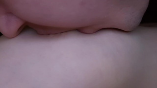 I blow my GF's nipples slobberingly. She moans loudly in pleasure