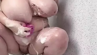 Harley Hangs washing her Humongous Breasts and Hairy Pussy