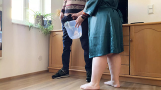 Dear mother-in-law takes off her panties and pees with her legs chunky open in a bucket next to her son-in-law