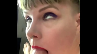 Moaning with Pleasure While Swallowing Cock